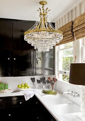 Chandlier in glamorous black and white kitchen.jpg